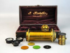 D2235 01 OBIETTIVO OTTONE FRATELLI KORISTA 1900 (MADE IN ITALY) + TELE OBIETTIVO NEGRI KORISTKA N°314 LENTI 100/40/60/80 + 4 FILTRI + LOUPE
