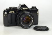 CANON AV1 NERA + OBIETTIVO 50:1,8 FD